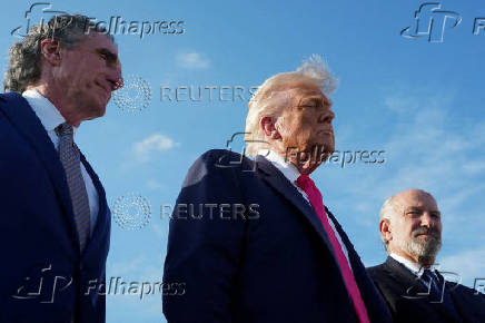 U.S. President Donald Trump speaks to members of the media upon his arrival from Pennsylvania, at Joint Base Andrews