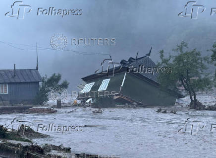 Floods strike the town of Brosteni in Romania