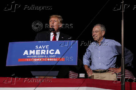 FILE PHOTO: Former U.S. President Trump holds rally in Iowa