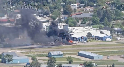Smoke rises following a plane crash at Kalispell City Airport