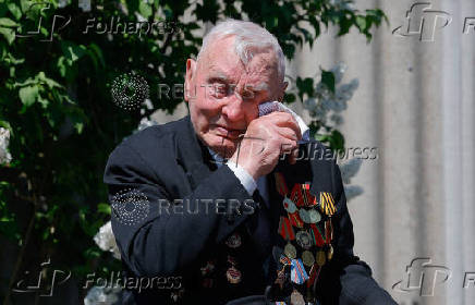 WW2 veteran Pampukhov receives congratulations on Victory Day amid Russia-Ukraine conflict in Donetsk region
