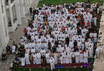 Palestinians from Gaza attend Eid al-Adha prayers, at Al Thumama Complex,  in Doha