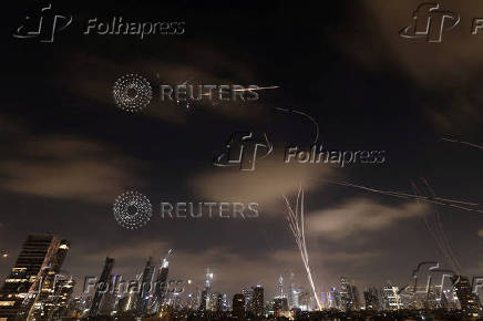 Missiles launched from Iran are intercepted as seen from Tel Aviv