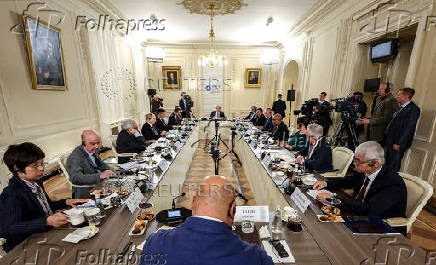 Russian President Vladimir Putin meets with heads of international news agencies in Saint Petersburg