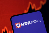 FILE PHOTO: Illustration shows HDB Financial Services logo and rising stock graph