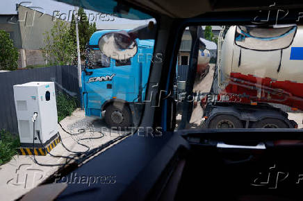 Sany electric heavy truck is parked at a charging station in Langfang, Hebei