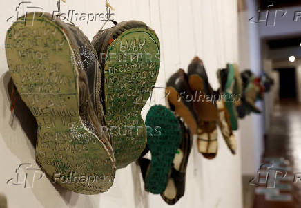 People attend an exhibition called 