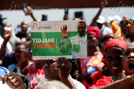 FILE PHOTO: Partisans of PDCI (Democratic Party of Cote d'Ivoire) protest at their headquarters in Abidjan