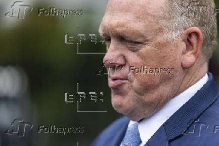 White House border czar Tom Homan talks with news media outside the White House