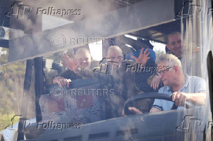 Ukrainian POWs are seen after a swap at an unknown location in Ukraine