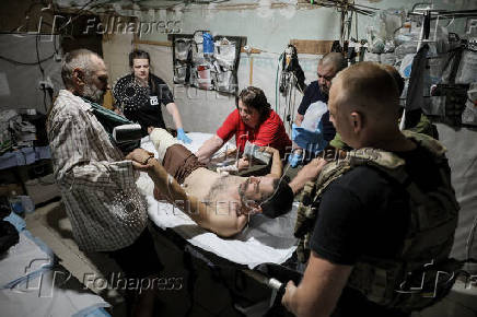 Ukrainian Armed Forces combat medics treat injured servicemen near Chasiv Yar