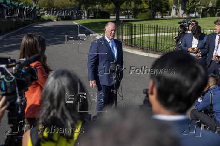 US Border Czar Tom Homan talks with news media outside the West Wing