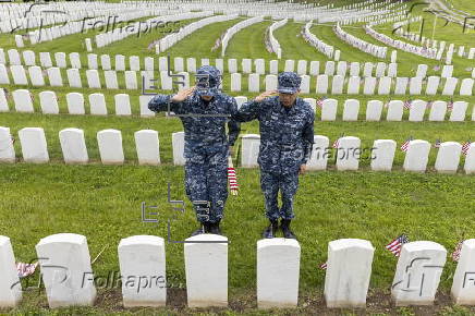 Flags placed on military veteran graves for Memorial Day in Brooklyn