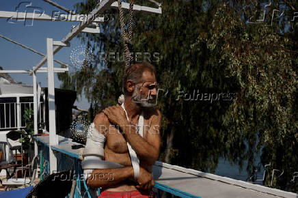 Wildfire burns houses, factories forcing evacuations near Patras