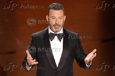 FILE PHOTO: Show host Jimmy Kimmel delivers his opening monologue at the 96th Academy Awards in Hollywood
