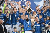 Lech Poznan team celebrate their Polish Extra League championship title