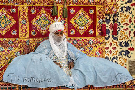 Muhammadu Sanusi II, the Emir of Kano State, sits  at his palace in Kano,
