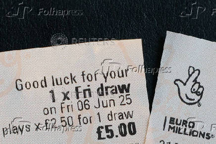 Photo illustration of EuroMillions lottery ticket
