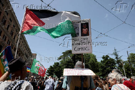 Pro-Palestinian protesters attend a demonstration calling for an end to the bombing in Gaza, in Rome