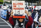 Pro Palestinians protest outside the US embassy in Jakarta