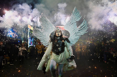 Bolivians celebrate the Gran Poder parade, in La Paz
