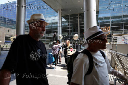 Israeli nationals arrive at Ben Gurion International airport from abroad, in Tel Aviv