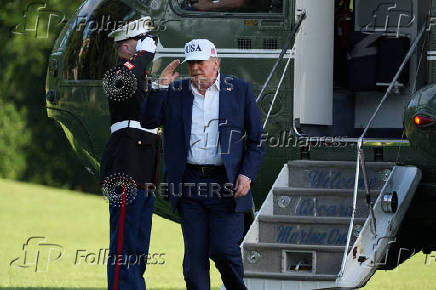 U.S. President Donald Trump arrives at the White House in Washington
