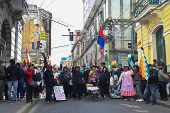 Evo Morales supporters march in mourning amid economic crisis, in La Paz
