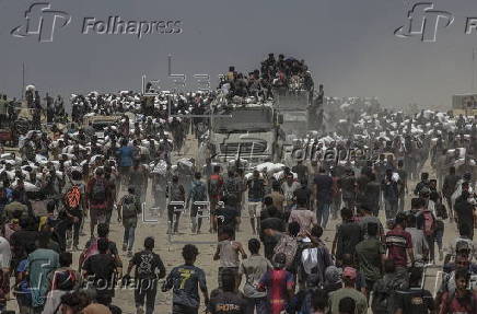 Aid enters Gaza Strip after Israel announces daily pause of hostilities