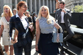 FILE PHOTO: Giuffre, an alleged victim of Epstein, walks after the hearing in the criminal case against him at Federal Court in New York