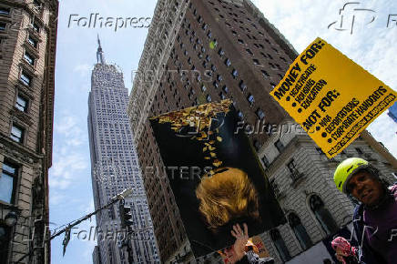 Protestors march during a May Day rally in New York