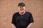 Rich Somora poses for a portrait at his home in Charlotte