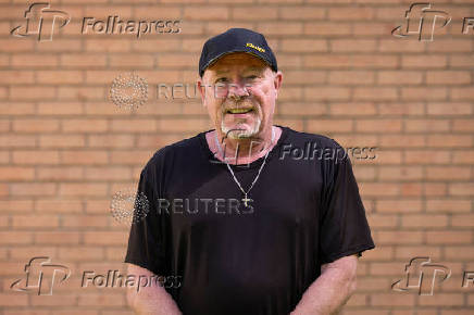 Rich Somora poses for a portrait at his home in Charlotte