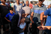 Palestinian mother mourns 3-month-old who died due to malnutrition, according to medics, in Khan Younis