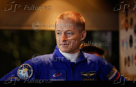 ISS crew departs the hotel for a pre-flight preparation, in Baikonur Cosmodrome