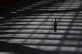 A man walks through a convention hall in Tokyo