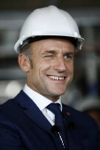 French President Macron visits reinstallation site of Olympic cauldron in Paris