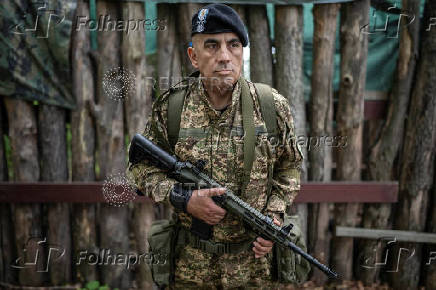 Foreign volunteers of the Ukrainian National Guard brigade attend military exercises at a training ground near a front line in Kharkiv region