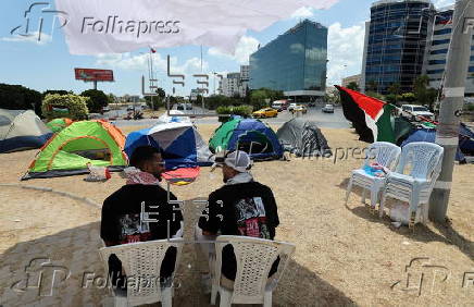 Pro-Palestinian demonstrators pitch protest camp in front of US embassy in Tunis