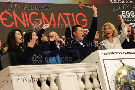 Traders work on the floor of the NYSE in New York