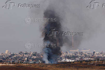 Smoke rises from Gaza, as seen from the Israel