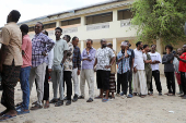 People have their biometrics recorded during voter registration, in Mogadishu