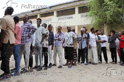 People have their biometrics recorded during voter registration, in Mogadishu
