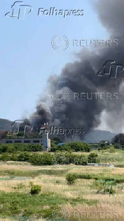 A general view shows smoke billowing after a South Korean navy maritime patrol aircraft crashed