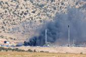 Smoke rises after a drone attack targeted oil facilities in the Zakho area of Iraq's Kurdistan region