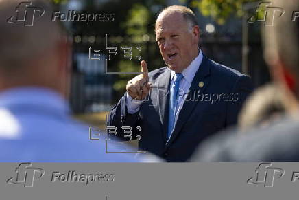 US Border Czar Tom Homan talks with news media outside the West Wing