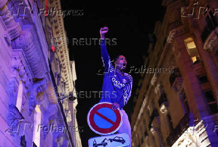 Champions League - Fans celebrate after Paris St Germain qualifies for the final