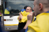 Ukrainian POWs are seen after a swap at an unknown location in Ukraine