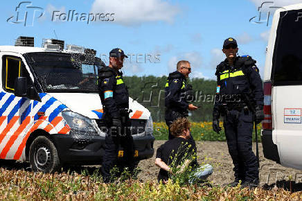 Extinction Rebellion activists block Dutch highway A44 ahead of the NATO summit at The Hague, near Abbenes