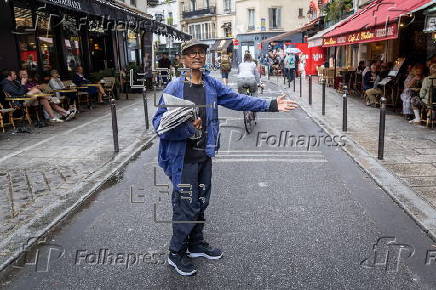 The last Newspaper Hawker in Paris to receive Order of Merit from President Macron